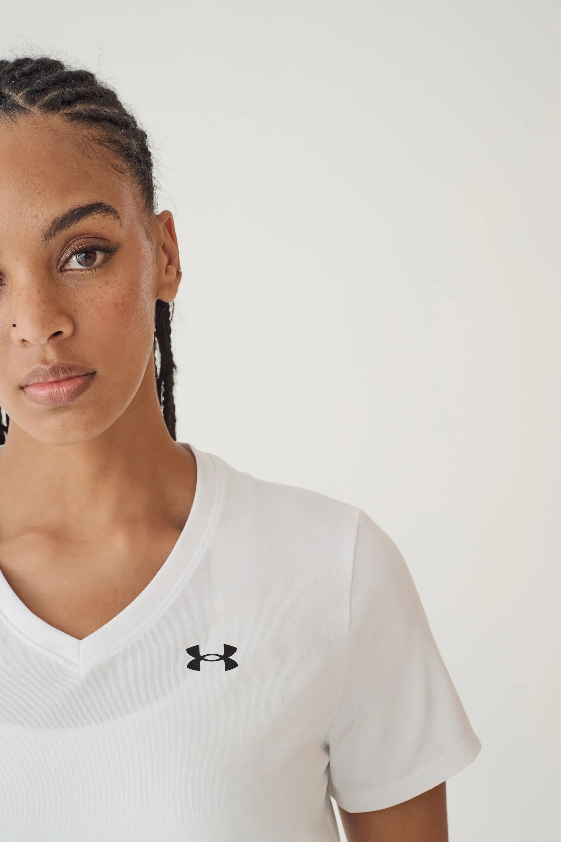 Under Armour - T-shirt tecnica con scollo a V